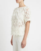 Blusa in tulle con frange