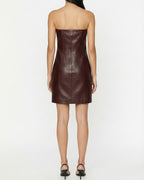 Abito corto in pelle con applicazioni gioiello