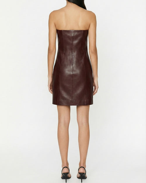 Abito corto in pelle con applicazioni gioiello