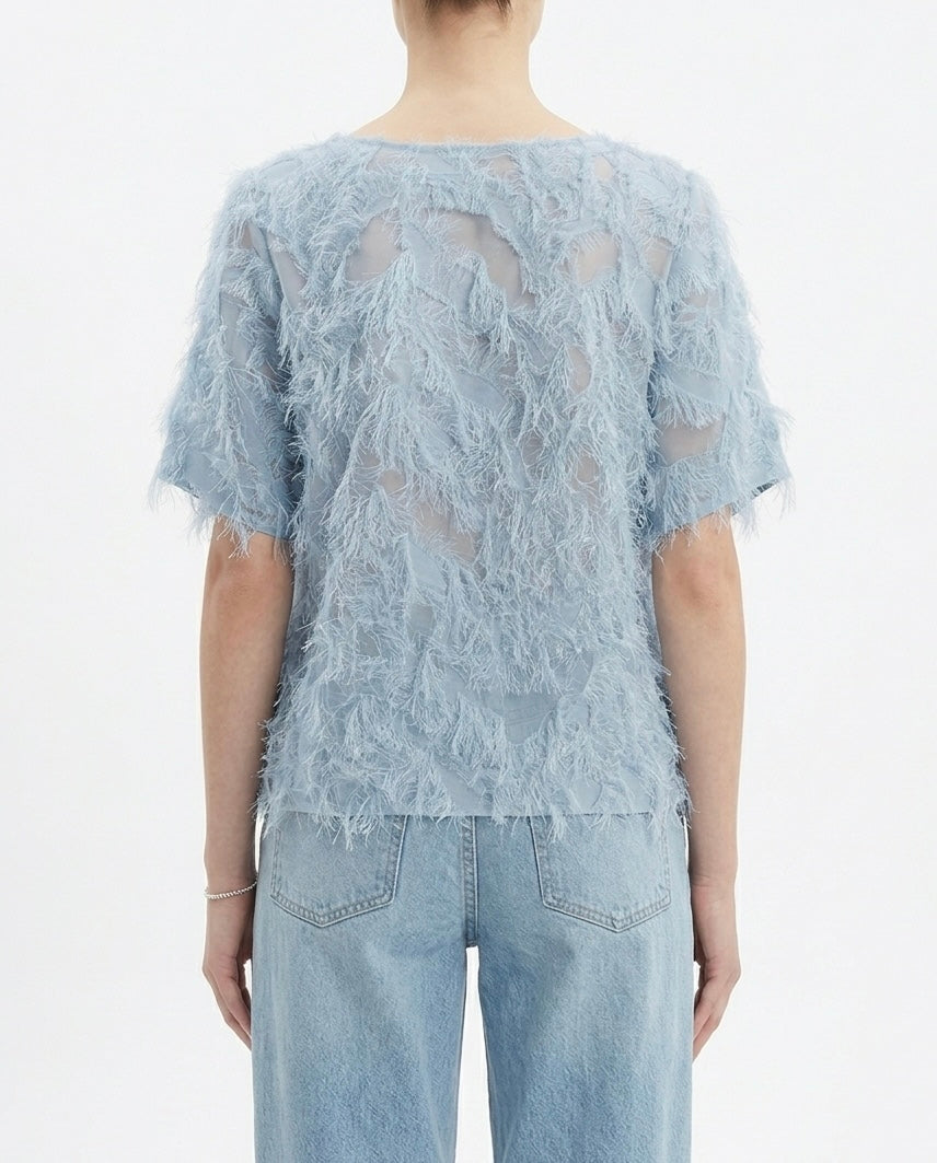 Blusa in tulle con frange