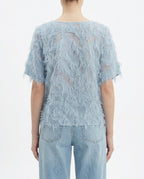 Blusa in tulle con frange