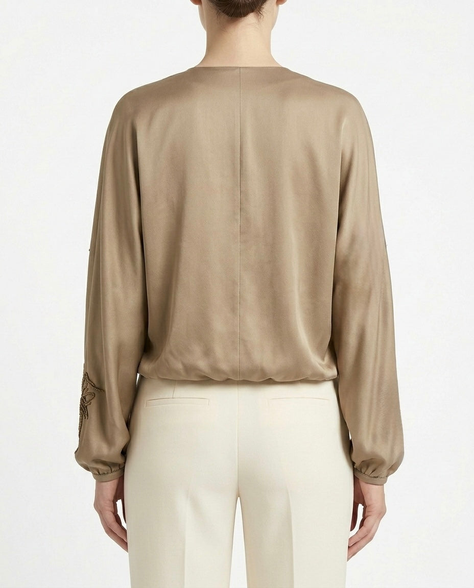 Blusa incrociata ricamata