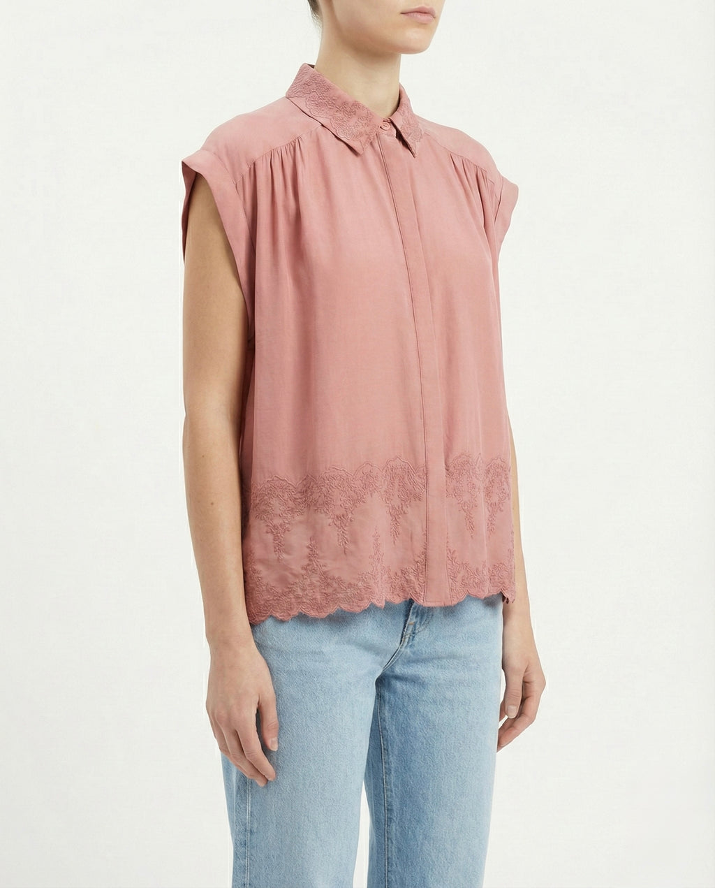 Blusa smanicato con ricamo floreale