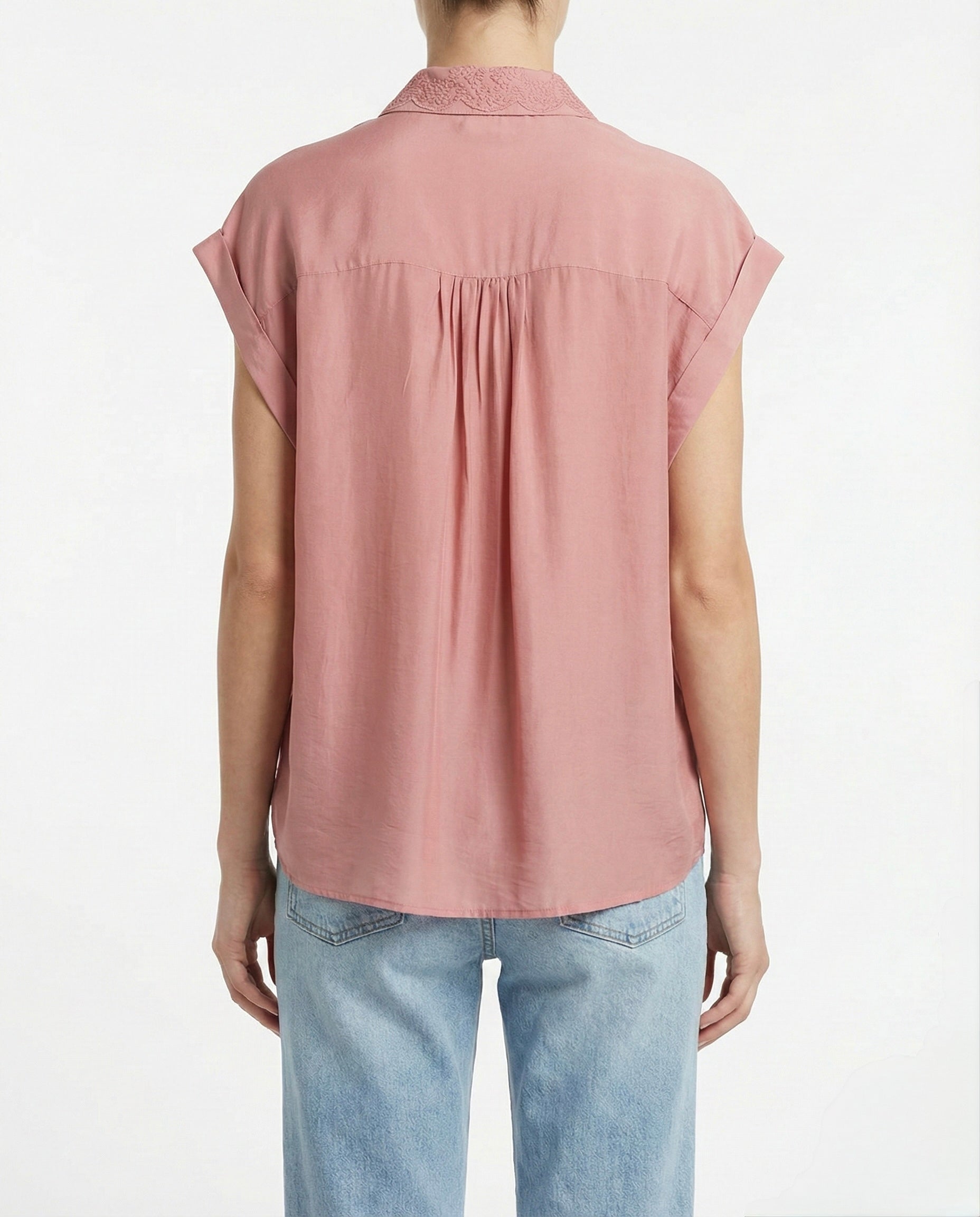 Blusa smanicato con ricamo floreale