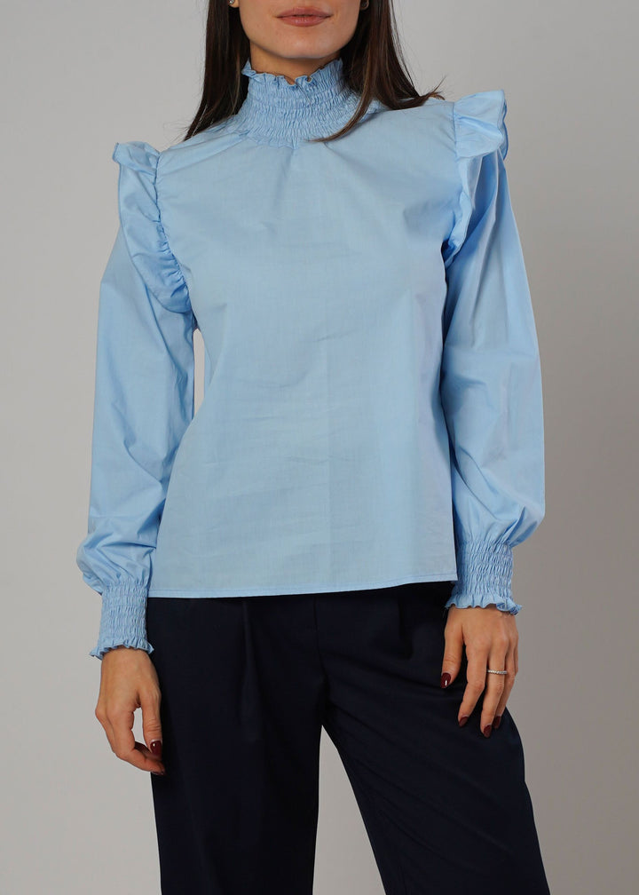 Camicia con dettagli a volant