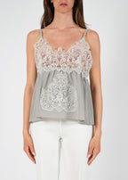 Top in seta con ricami in pizzo