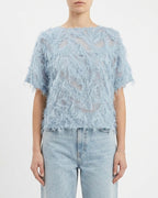 Blusa in tulle con frange