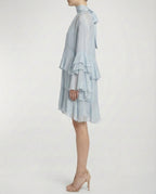 Abito corto con balze