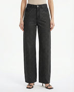 Jeans neri a gamba larga con applicazioni