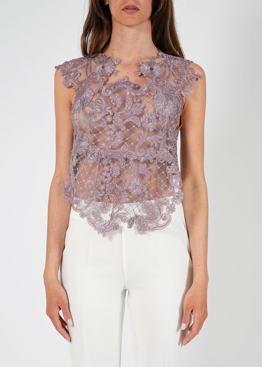 Top in pizzo ricamato con trasparenze floreali