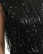 Abito midi nero con frange e paillettes