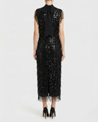 Abito midi nero con frange e paillettes