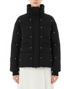 Piumino con dettagli gioiello