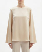 Blusa in raso con maniche ampie