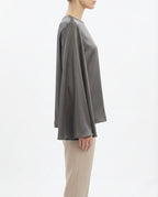 Blusa in raso con maniche ampie