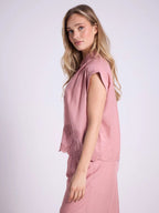 Blusa smanicato con ricamo floreale