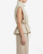 Gilet con coulisse in vita e tasche frontali