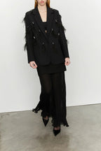 Blazer con piume decorative