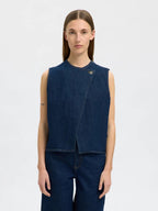 Top smanicato in denim con chiusura asimmetrica