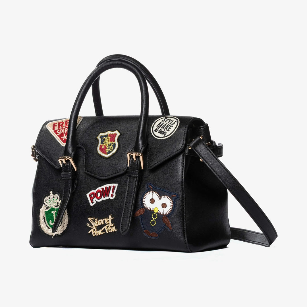Borsa nera con patch ricamate e tracolla