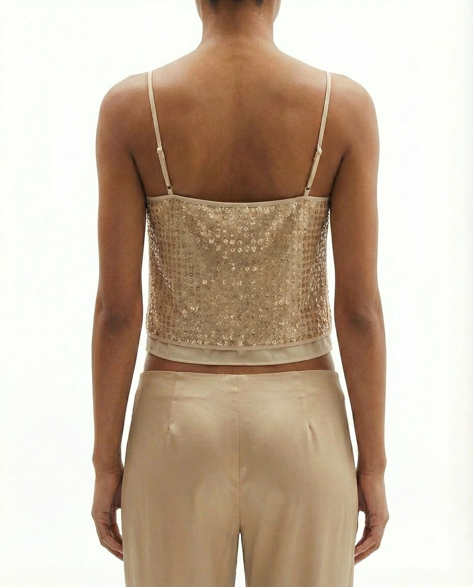 Top paillettes oro con spalline sottili