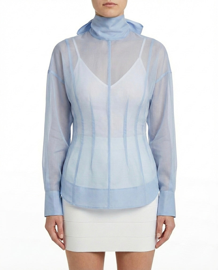 Blusa velata con collo alto
