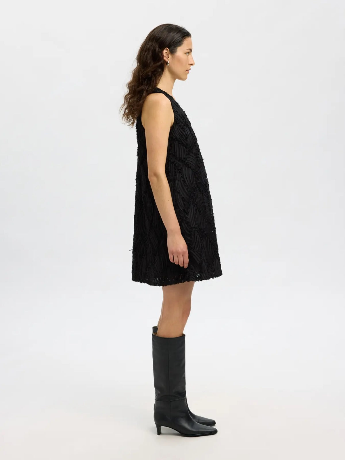 Abito corto con texture a rilievo