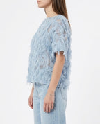 Blusa in tulle con frange
