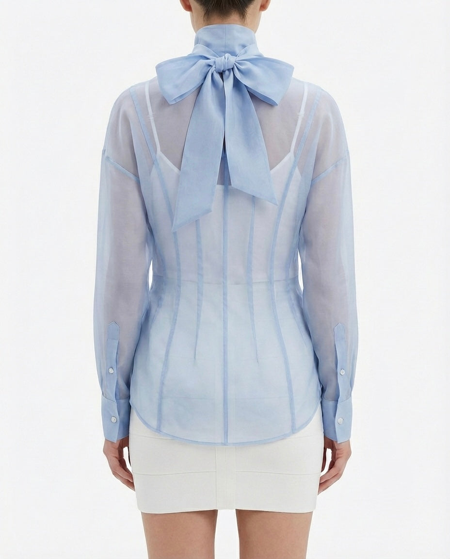 Blusa velata con collo alto