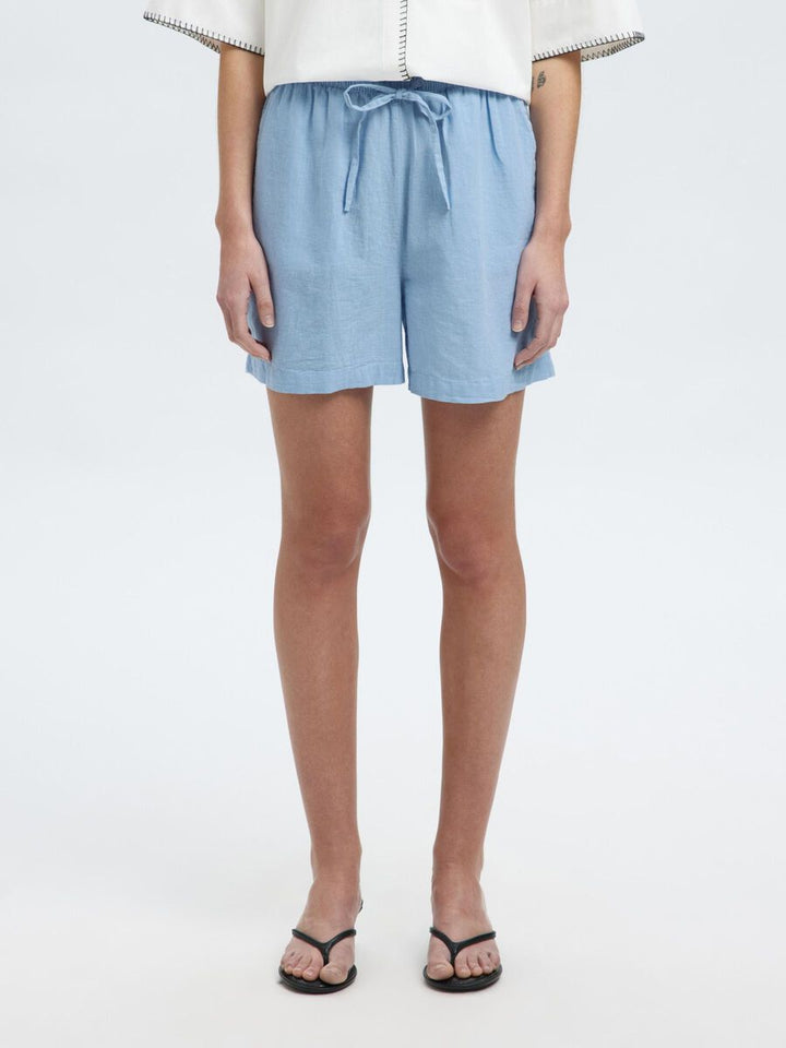 Shorts in lino celeste con coulisse