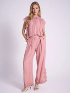 Pantalone ampio con ricamo floreale