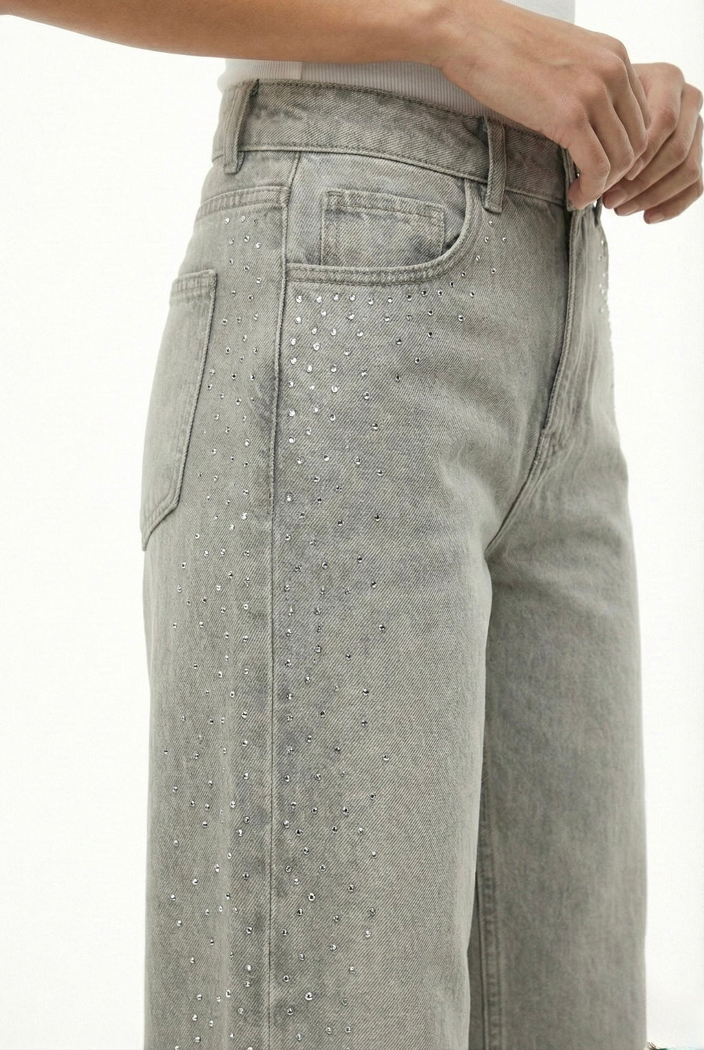 Jeans beige con strass laterali
