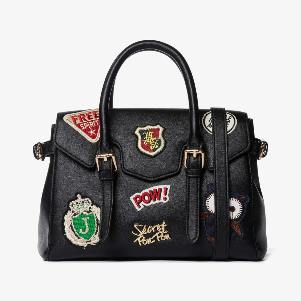 Borsa nera con patch ricamate e tracolla