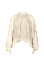 Blusa con maniche fluide e balze
