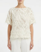 Blusa in tulle con frange