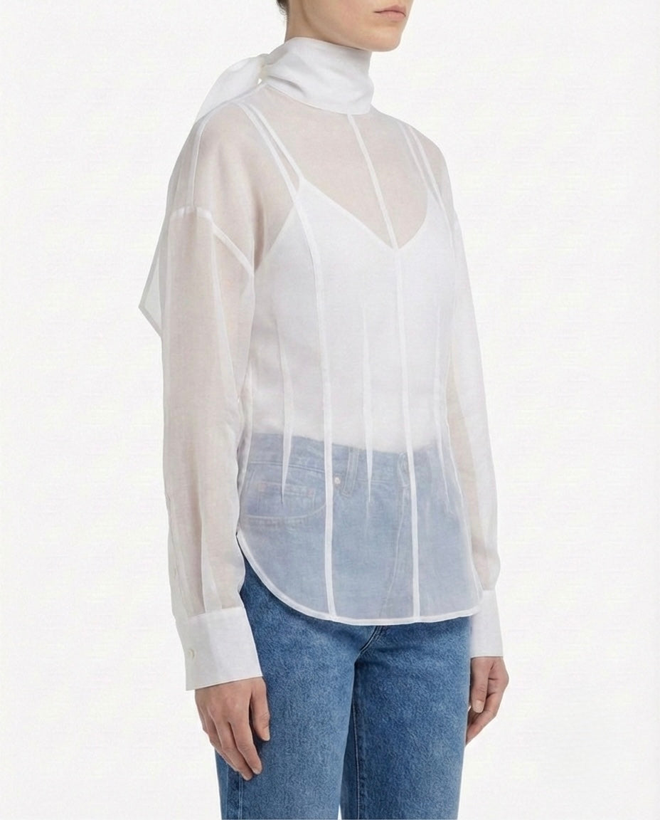 Blusa velata con collo alto
