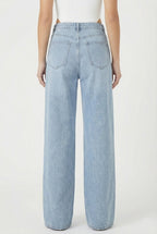 Jeans palazzo con ricami floreali