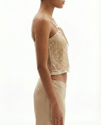 Top paillettes oro con spalline sottili