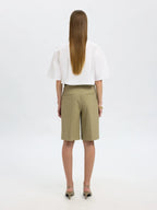 Camicia bianca con maxi fiocco