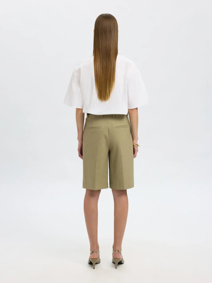 Camicia bianca con maxi fiocco