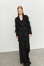 Blazer con piume decorative
