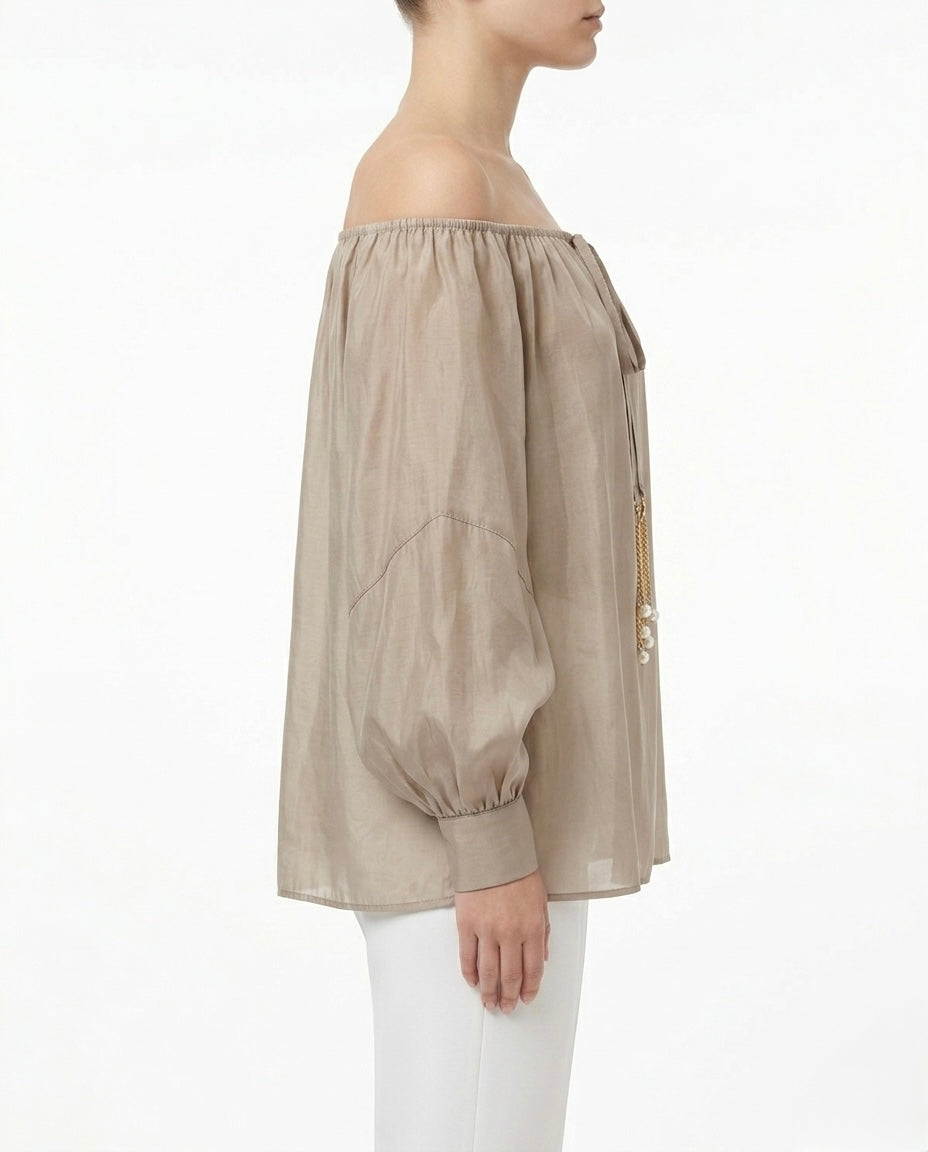 Blusa con laccetto