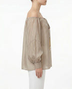 Blusa con laccetto