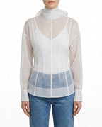 Blusa velata con collo alto