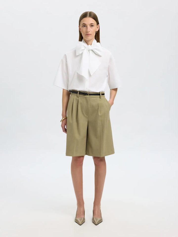 Camicia bianca con maxi fiocco